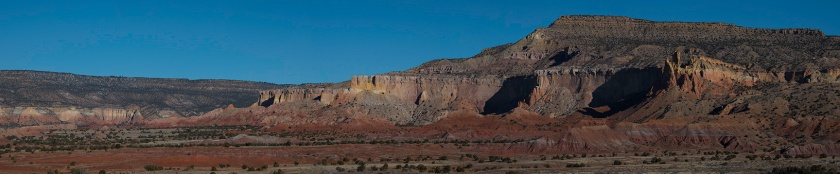 Panoramic view, looking towards the red rock formations at Ghost Ranch. 